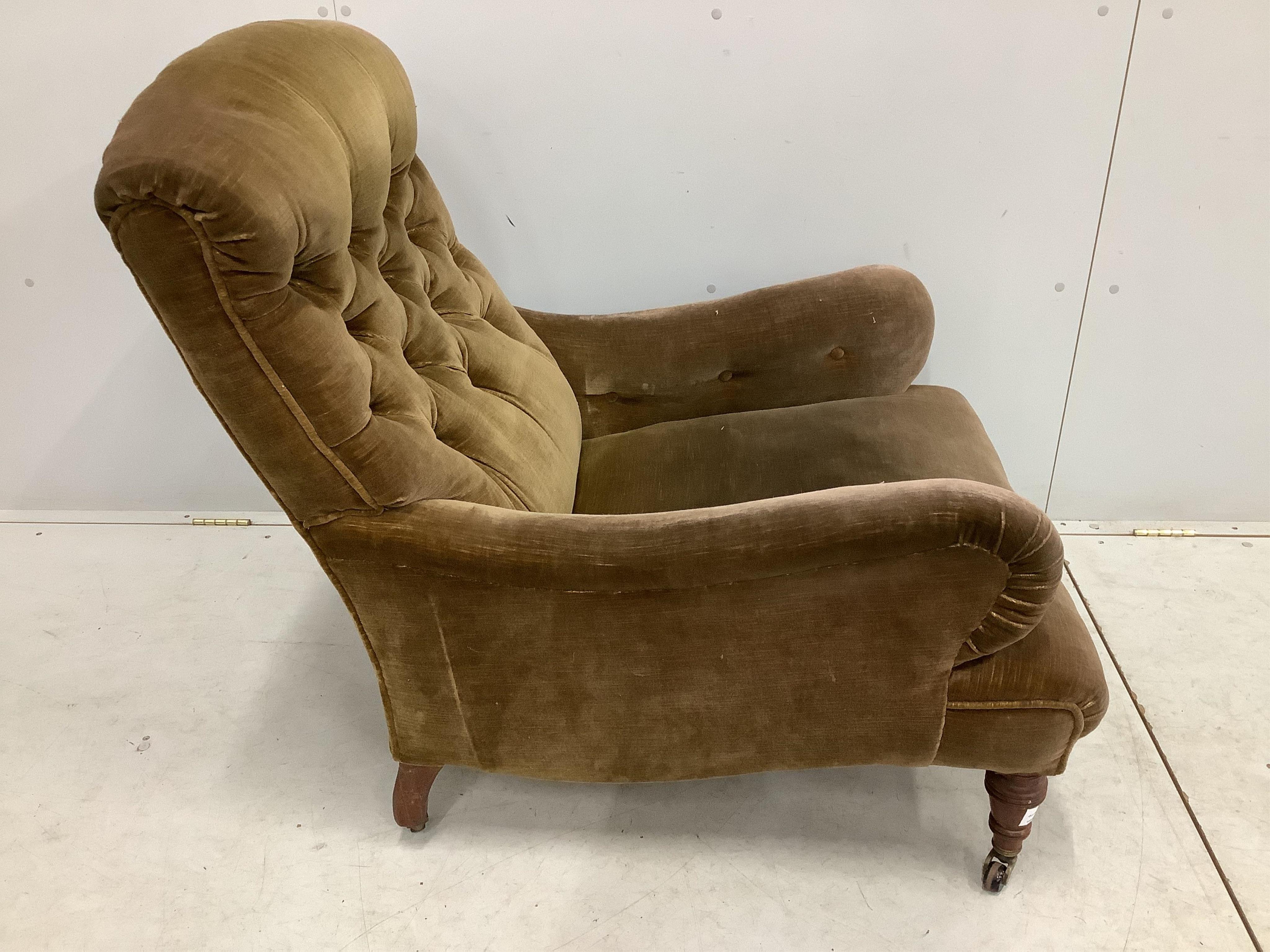 A Victorian Howard style armchair, width 76cm, depth 86cm, height 92cm. Condition - fair